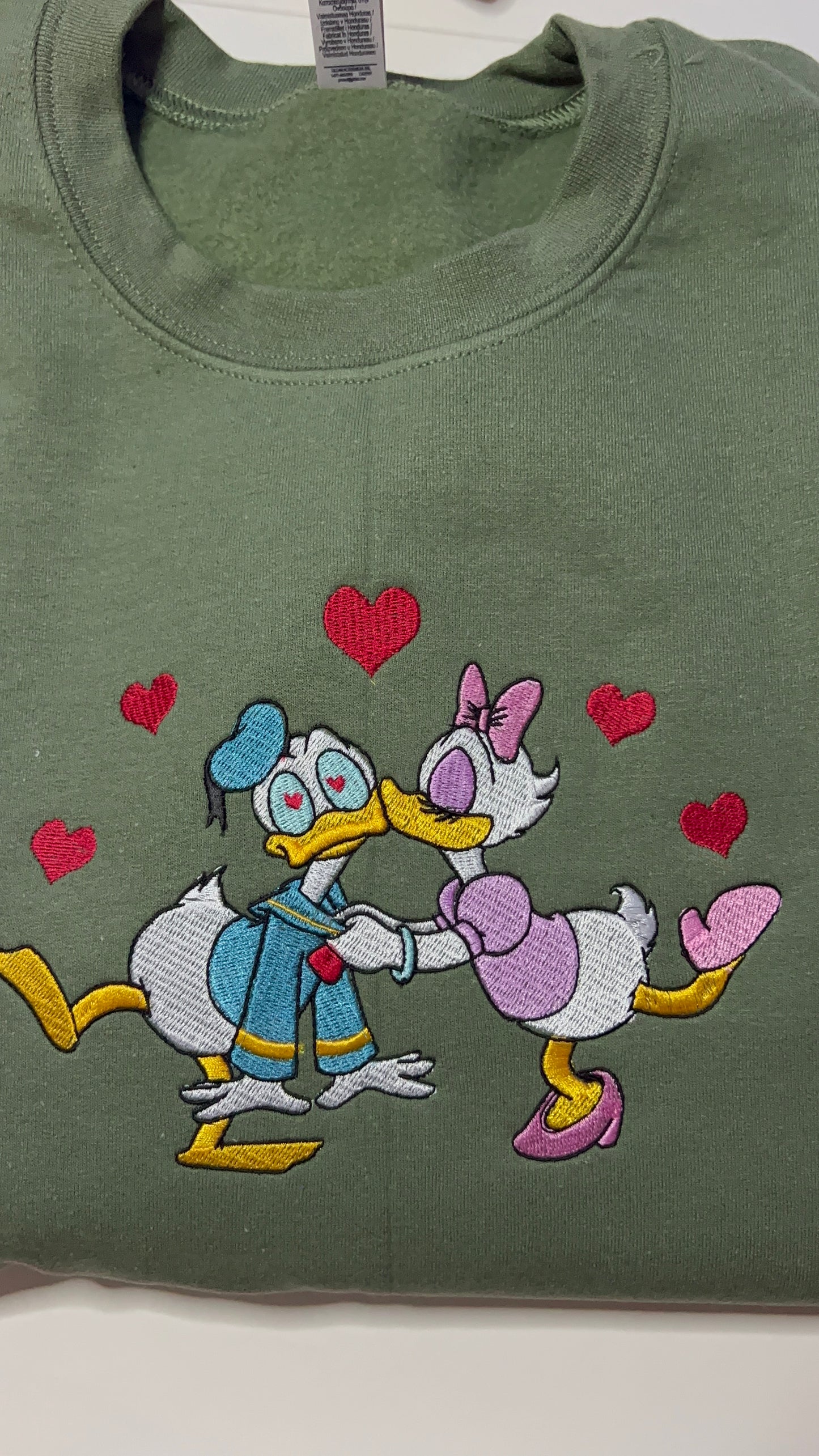 Donald n Daisy Love is in the Air Embroidered Sweater